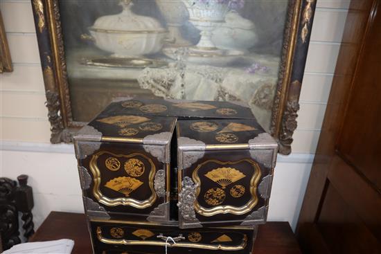 A good Japanese silver mounted gold lacquered table cabinet, Meiji period, H. 53cm, W. 43cm, minor faults